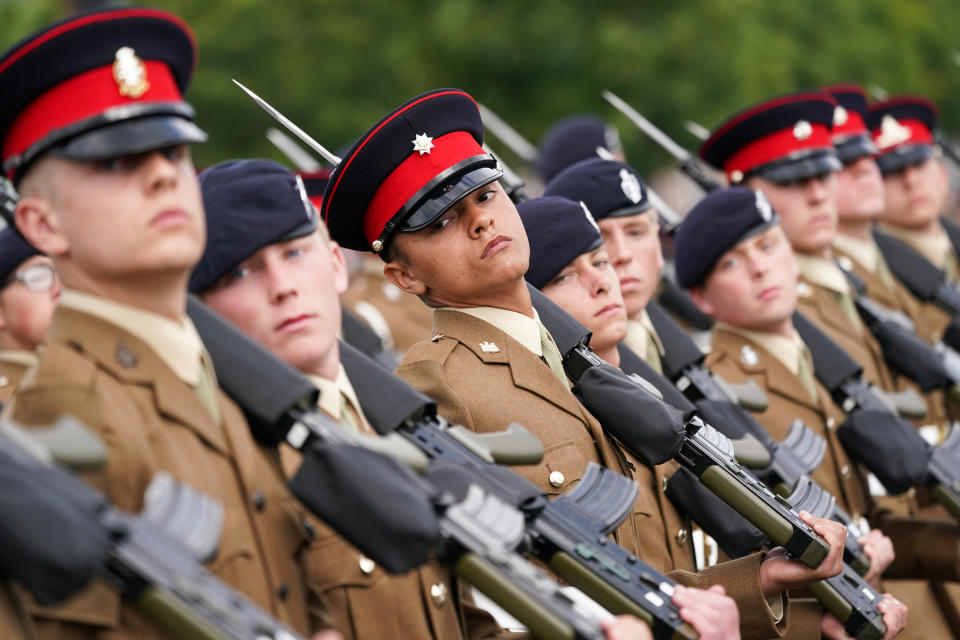 <p>HARROGATE, ENGLAND - AUGUST 05: Junior Soldiers from the Army Foundation College in Harrogate take part in their graduation parade on August 05, 2021 in Harrogate, England. The graduation parade marked the culmination up to 12 months of military training for over 700 of the British Army's newest future soldiers. Junior Soldiers from the Army Foundation College Harrogate completed initial soldier training that includes military skills, leadership training, physical development lessons, teamwork, and the Duke of Edinburgh's award. Family, friends and guests of the junior soldiers attended the parade, which was presided over by Lieutenant General Ian Cave CB, Commander Home Command and Standing Joint Commander (UK). The proceedings included a parachute display, fly past, music from a military band and the first use of Captain Sir Tom Moore Walk, a memorial walkway. (Photo by Ian Forsyth/Getty Images)</p>
