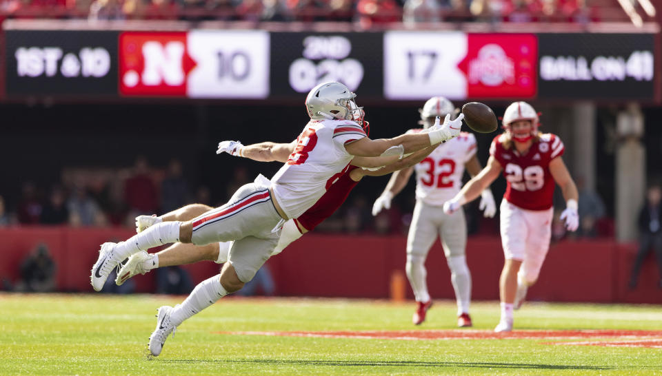 Nebraska's JoJo Domann, obscured behind, tips away a pass intended for Ohio State's Jeremy Ruckert during the first half of an NCAA college football game Saturday, Nov. 6, 2021, at Memorial Stadium in Lincoln, Neb. (AP Photo/Rebecca S. Gratz)