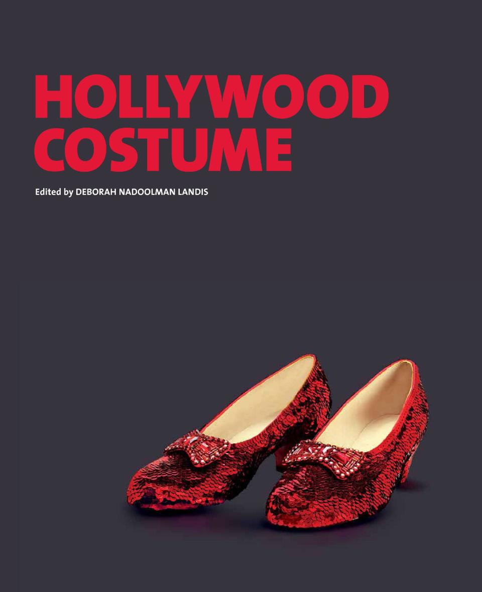 This book cover image released by Harry N. Abrams shows "Hollywood Costume," by Deborah Nadoolman Landis. The holidays bring out the inner-coffee table book obsessive in gift buyers. They're easy, weighty and satisfying to give. (AP Photo/Harry N. Abrams)