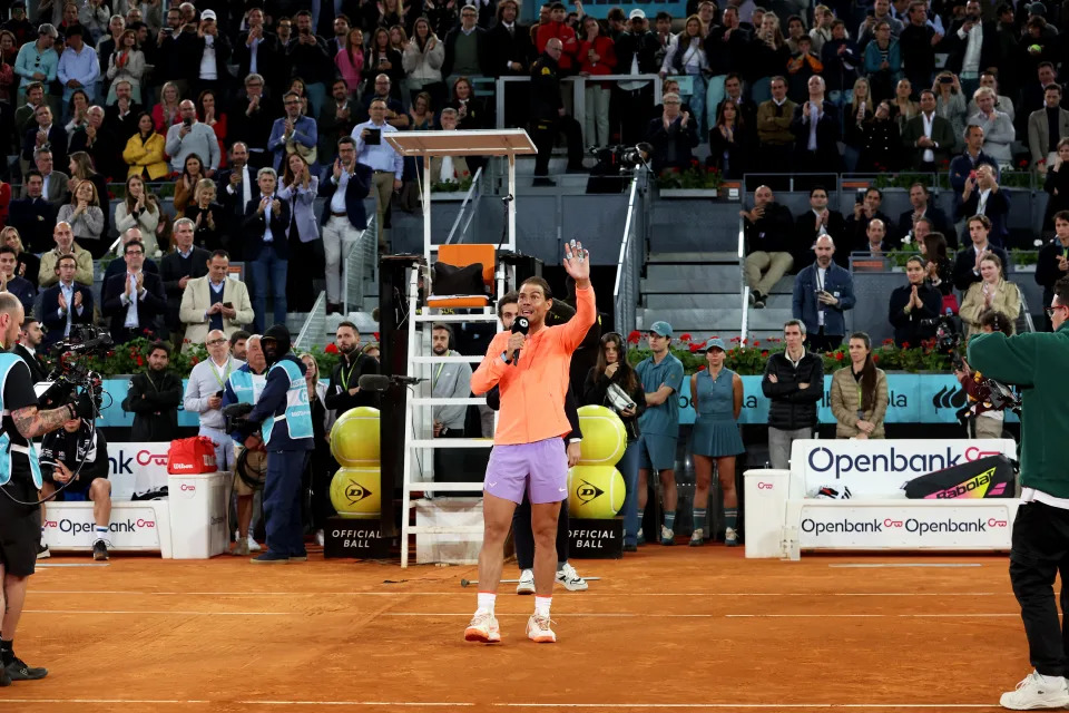 Rafa Nadal waves to the crowd.