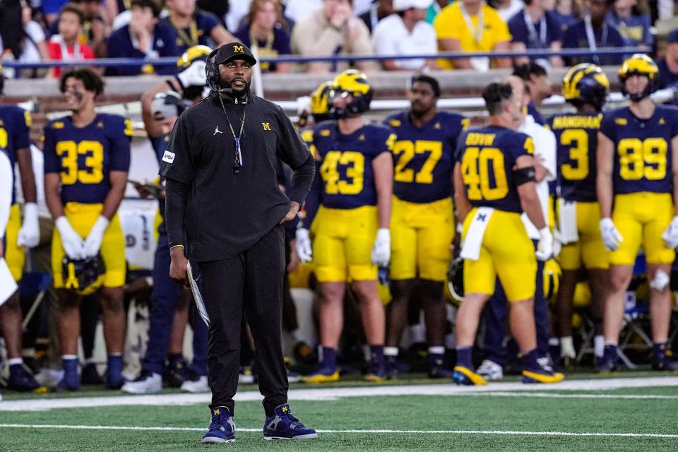 Michigan head coach Sherrone Moore looks up during the first half against Fresno State at Michigan Stadium at Michigan Stadium in Ann Arbor on Saturday, Aug. 31, 2024.