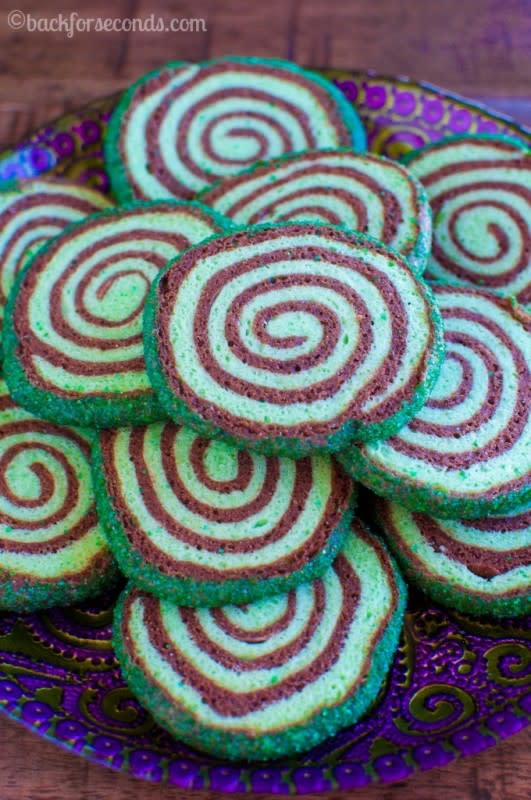 <p>Back For Seconds</p><p>Mint Chocolate Sugar Cookie Pinwheels are soft, chewy, and so pretty! </p><p>Get the recipe: <a href="http://backforseconds.com/mint-chocolate-sugar-cookie-pinwheels/" rel="nofollow noopener" target="_blank" data-ylk="slk:Mint Chocolate Sugar Cookie Pinwheels;elm:context_link;itc:0;sec:content-canvas" class="link rapid-noclick-resp"><strong>Mint Chocolate Sugar Cookie Pinwheels</strong></a></p>