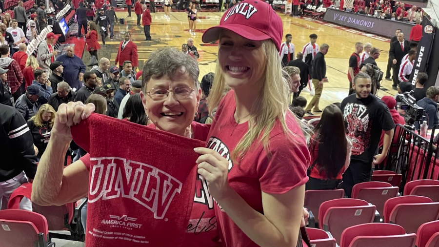 Janet Hopper and her granddaughter Ashley Walls get ready to cheer on the Runnin’ Rebels at a basketball game.