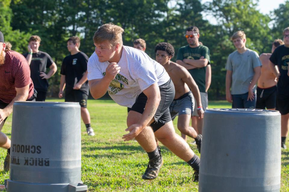 Jayden Rivera, OL, DL, runs drills during Brick Memorial High School football practice at Brick Memorial High School in Brick, NJ Monday, August 8, 2022.