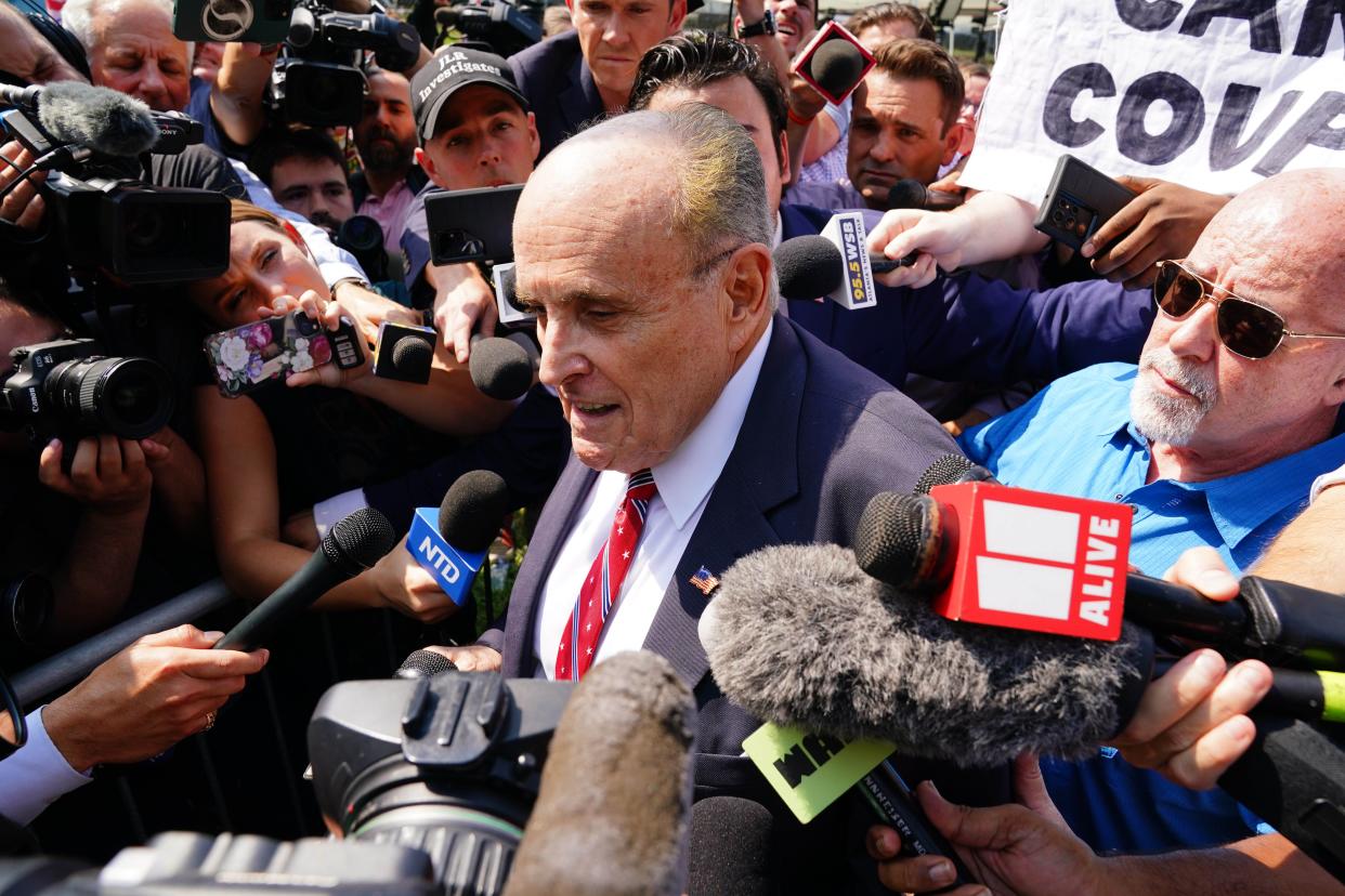 Aug 23, 2023; Atlanta, GA, USA; Former Trump attorney Rudy Giuliani speaks with the media after being processed at the Fulton County Jail. A grand jury in Fulton County, Georgia indicted Donald Trump. The indictment includes 41 charges against 19 defendants, from the former president to his former attorney Rudy Guiliani and former White House Chief of Staff Mark Meadows. The legal case centers on the state’s RICO statute, the Racketeer Influenced and Corrupt Organizations Act.