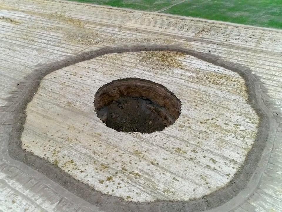 Giant sinkholes form around Tehran due to drought and excessive water pumping in Iranian capital