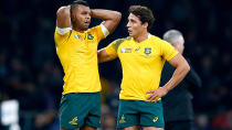 Kurtley Beale and Nick Phipps look on in agony.