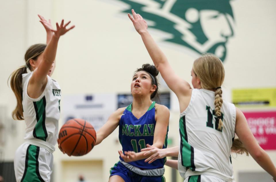 McKay's Patricia Mike (11) goes up for a basket during the game against West Salem on Tuesday, Jan. 11, 2022 at West Salem High School in West Salem, Ore.