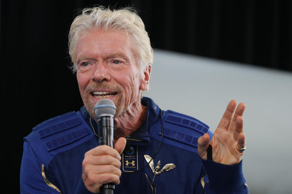 Billionaire entrepreneur Richard Branson wears his astronaut's wings at a news conference, after flying with a crew in Virgin Galactic's passenger rocket plane VSS Unity to the edge of space at Spaceport America near Truth or Consequences, New Mexico, U.S., July 11, 2021. REUTERS/Joe Skipper