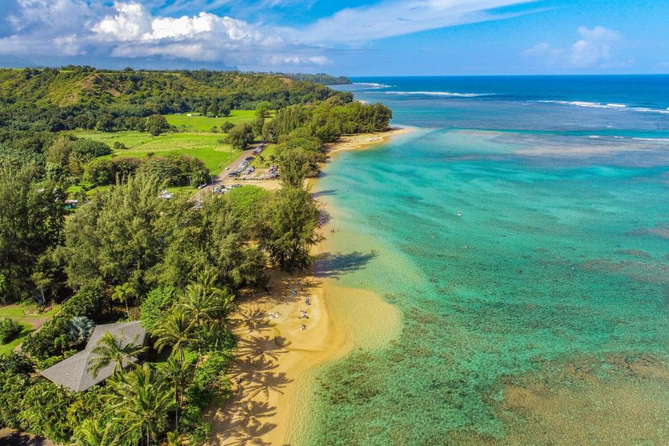 "Anini Beach boasts the largest coral/barrier reef in the Hawaiian islands, creating a natural lagoon environment where you can take advantage of world class stand-up paddling, kite-surfing, and snorkeling right in your backyard,