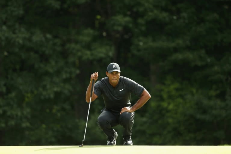 Tiger Woods struggled in hitting only half of the 18 Boston greens to post a one-over-par 72