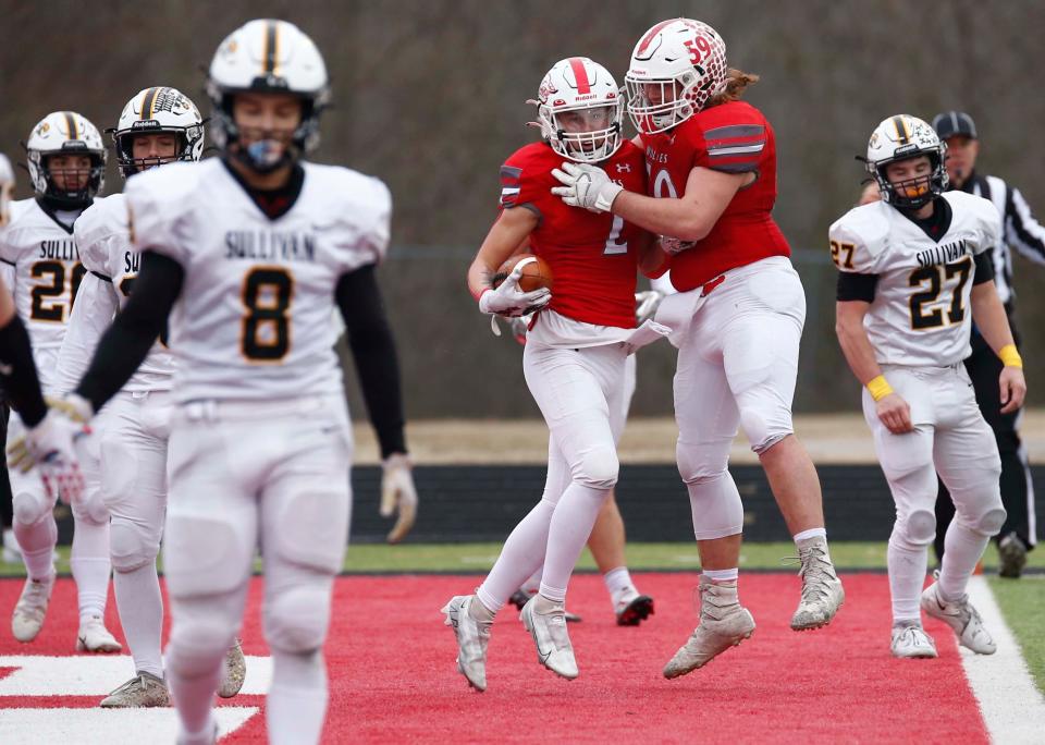 Tracen Cobb celebrates in the endzone after scoring a touchdown during Reeds Spring's 49-20 win over Sullivan in a Class 3 state semifinal football game on Saturday, Nov. 26, 2022, in Reeds Spring, Missouri.