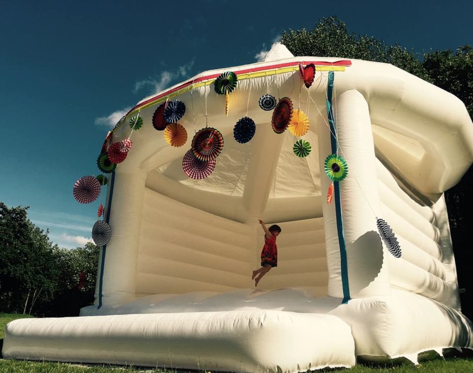 Wedding bouncy castles are sure to be the wedding trend of the year [Photo: A Wedding Wonderland]