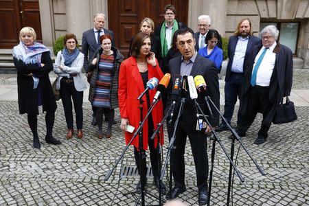 Leaders of the German Green Party Katrin Goering-Eckardt and Cem Ozdemir speak to the media as they arrive for exploratory talks at the German Parliamentary Society about forming a new coalition government in Berlin, Germany, November 16, 2017. REUTERS/Axel Schmidt