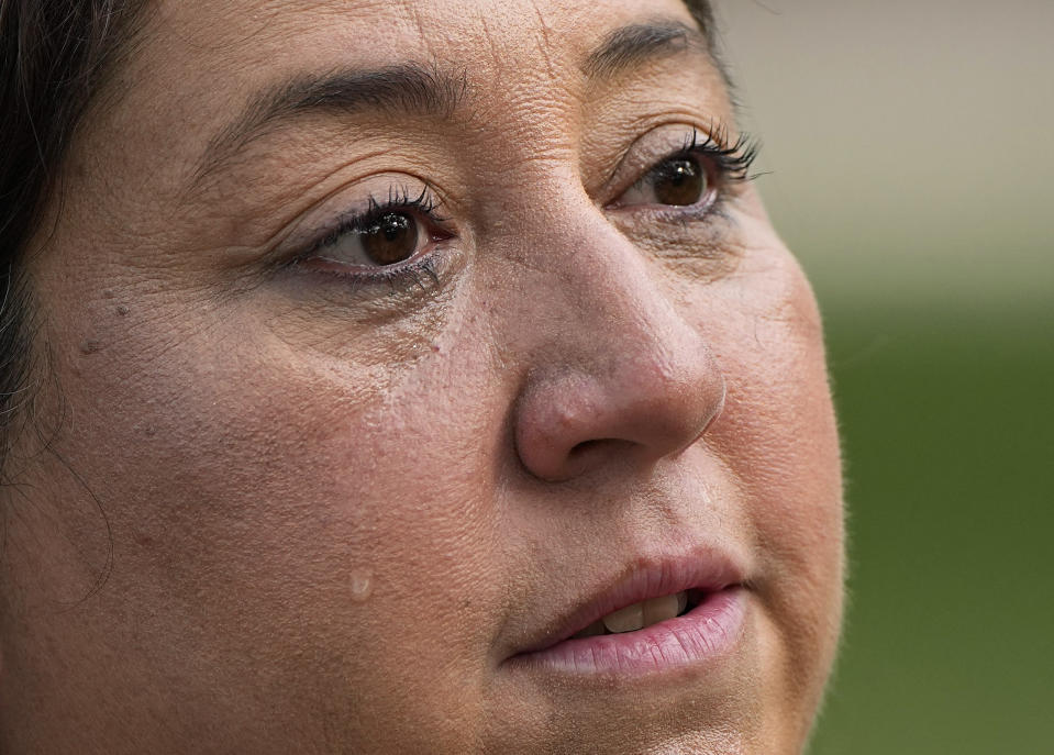 Veronica Mata sheds a tear as talks about her daugher, Tess, and her challenges in the past year in Uvalde, Texas, Wednesday, May 3, 2023. For Mata, teaching kindergarten in Uvalde after her daughter was among the 19 students who were fatally shot at Robb Elementary School became a year of grieving for her own child while trying to keep 20 others safe. (AP Photo/Eric Gay)