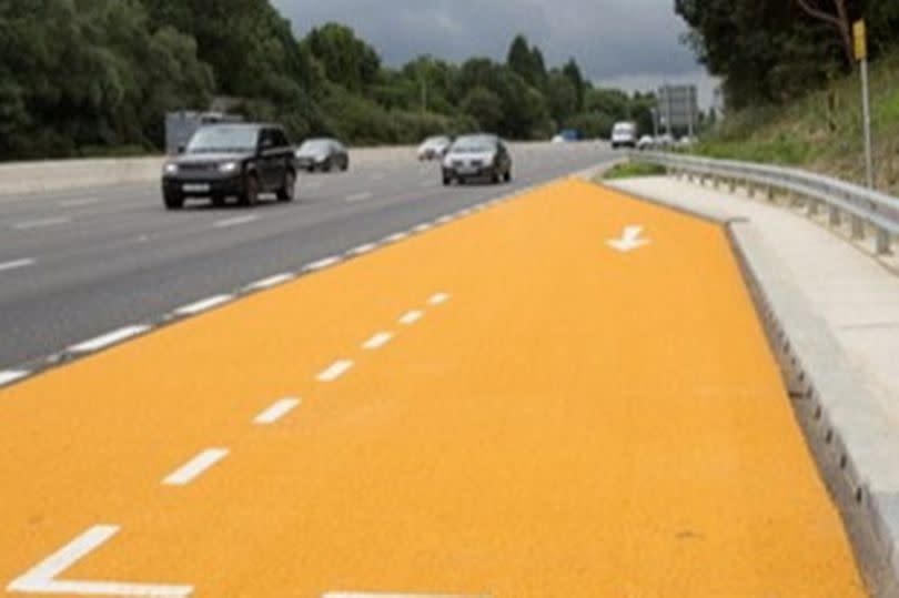 Emergency areas will be marked with a bright orange road surface -Credit:National Highways