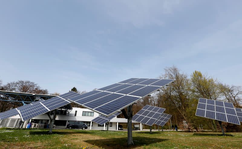 FILE PHOTO: Solar panels surround the entrance to the Wacker Chemie AG facility in the south-east Bavarian town of Burghausen