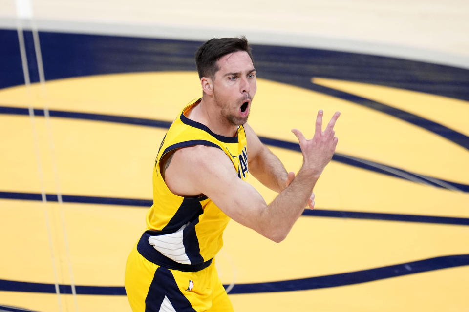 Indiana Pacers guard T.J. McConnell celebrates after making a basket during the second half against the Milwaukee Bucks in Game 6 in an NBA basketball first-round playoff series, Thursday, May 2, 2024, in Indianapolis. (AP Photo/Michael Conroy)