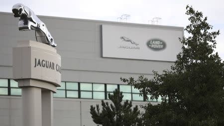 Signs are seen outside the Jaguar Land Rover plant at Halewood in Liverpool, northern England, September 12 , 2016. REUTERS/Phil Noble