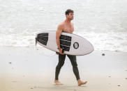 <p>Chris Hemsworth and Elsa Pataky hit the beach in Byron Bay. </p>