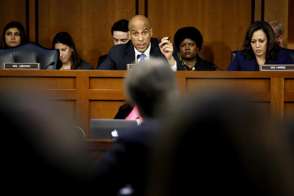 Sen. Cory Booker, D-N.J., center, next to Sen. Kamala Harris, D-Calif., questions Brett Kavanaugh as he testifies before the Senate Judiciary Committee. (Photo: Jacquelyn Martin/AP)