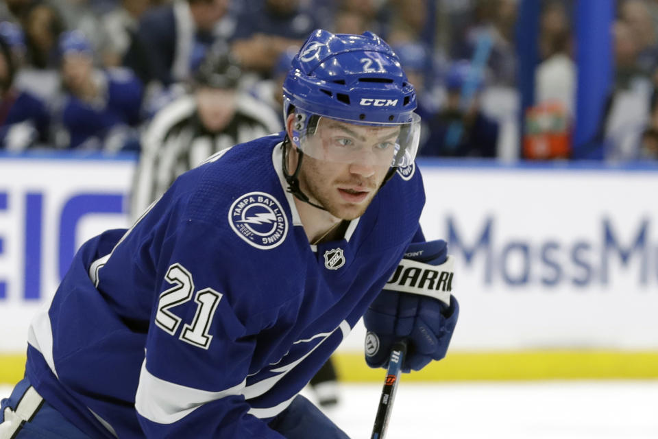 FILE - In this April 12, 2019, file photo, Tampa Bay Lightning center Brayden Point (21) is shown during the second period of Game 2 of an NHL Eastern Conference first-round hockey playoff series against the Columbus Blue Jackets, in Tampa, Fla. With NHL training camps set to open this week, roughly a dozen prominent restricted free agents still don’t have contracts, including Tampa Bay’s Brayden Point, Toronto’s Mitch Marner, Boston’s Charlie McAvoy and Brandon Carlo and Colorado’s Mikko Rantanen. Those absences could hang over their teams for days, weeks or even months and have raised questions about why it’s taken so long to get them signed. (AP Photo/Chris O'Meara, File)