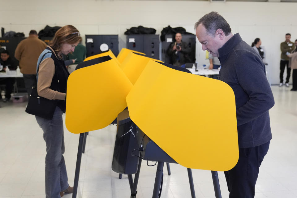 Rep. Adam Schiff, D-Calif., right, votes Tuesday, March 5, 2024, in Burbank, Calif. Schiff is running for U.S. Senate to replace the late Sen. Dianne Feinstein. (AP Photo/Marcio Jose Sanchez)