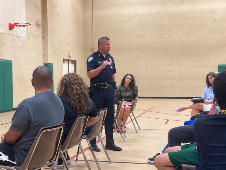 Palm Springs Police Chief Andrew Mills speaks during a neighborhood town hall about crime in Desert Highland Gateway Estates on Wednesday, May 24, 2022.