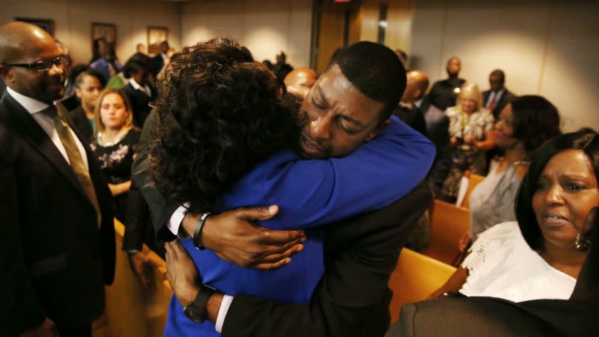 DALLAS, TX - AUGUST 28: Odell Edwards, father of Jordan Edwards, gets a hug from Dallas County district attorney Faith Johnson after hearing a guilty of murder verdict during the ninth day of the trial of fired Balch Springs police officer Roy Oliver, who was charged with the murder of 15-year-old Jordan Edwards, at the Frank Crowley Courts Building on August 28, 2018 in Dallas, Texas. (Photo by Rose Baca - Pool/Getty Images) ** OUTS - ELSENT, FPG, CM - OUTS * NM, PH, VA if sourced by CT, LA or MoD **