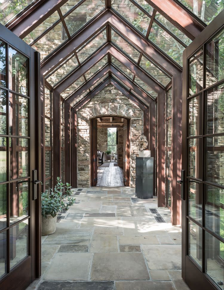 Glass, Flooring, Fixture, Daylighting, Walkway, Iron, Shade, Symmetry, Flagstone, Transparent material, 