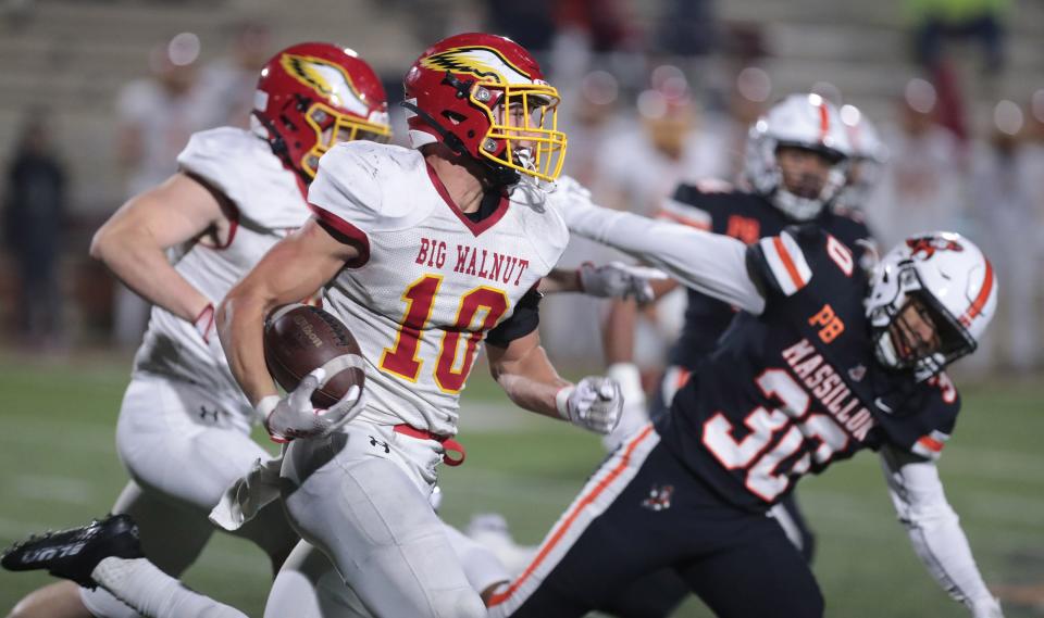 Big Walnut's Garrett Stover runs for a gain in the first half against Massillon at Mansfield's Arlin Field in this Div. II playoff game Friday, November 11, 2022.