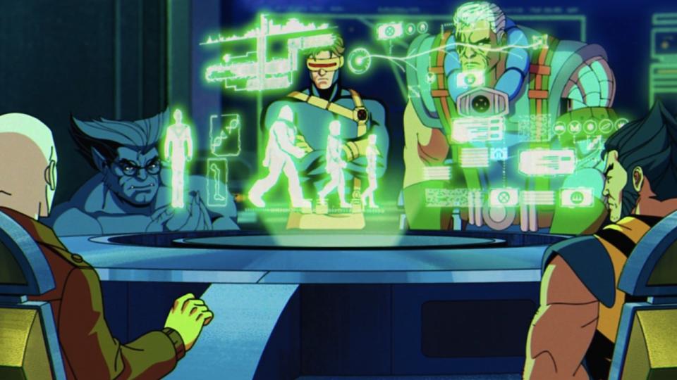 Morph, Wolverine, Cable, Beast and Cyclops looking at holographic display
