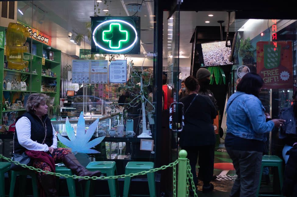Patrons line up outside of Weed World in Time Square in Manhattan.