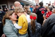 Liberal leader and Canadian Prime Minister Justin Trudeau, his wife Sophie Gregoire Trudeau, their sons Hadrien and Xavier and daughter Ella-Grace visit a local restaurant during an election campaign visit to Tilbury