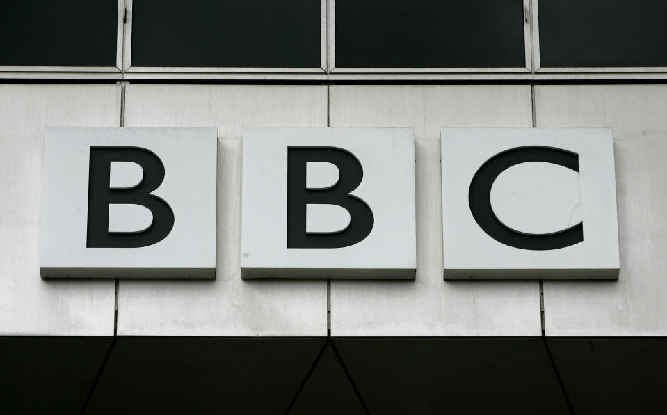 FILE - This Oct. 17, 2007, file photo, shows the BBC, British Broadcasting Corporation sign on their offices at White City in London. A BBC correspondent in China, John Sudworth, has relocated to Taiwan, saying he faced threats and intimidation from authorities in Beijing. Britain’s national broadcaster confirmed the move on Wednesday, March 31, 2021, but did not specify why Sudworth had left China. The BBC said his work “has exposed truths the Chinese authorities did not want the world to know.”(AP Photo/Kirsty Wigglesworth, File)