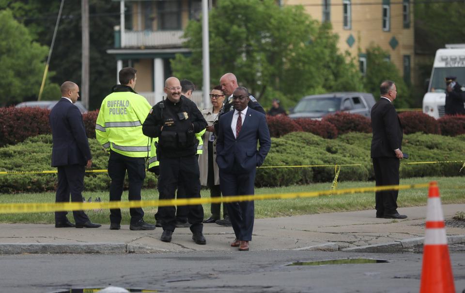 People came to the area of the Tops Friendly Market in Buffalo, NY May 16, 2022 site of the mass shooting, some to leave flowers other to give back in some way to their neighbors and community.  During the early evening Buffalo Mayor Byron Brown walked around the Tops sidewalk.