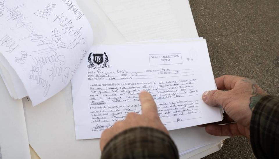 Colin Buckley shows paperwork of his rule violation at the Academy at Ivy Ridge. At 15, Buckley was sent to the Academy at Ivy Ridge, the same boarding school that is the subject of the Netflix documentary, “The Program: Cons, Cults and Kidnapping.” Andy Alfaro/aalfaro@modbee.com