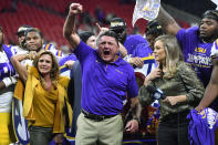 LSU head coach Ed Orgeron celebrates after the Southeastern Conference championship NCAA college football game against Georgia, Saturday, Dec. 7, 2019, in Atlanta. LSU won 37-10. (AP Photo/John Amis)