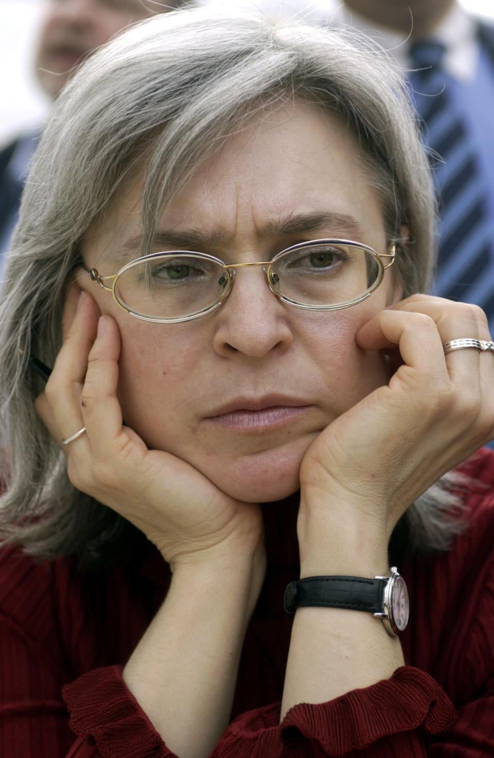 Russian human rights advocate, journalist and author Anna Politkovskaya is seen 17 March 2005 at the book fair in Leipzig, eastern Germany, where she presented her book titled ‘In Putin's Russia’ (DDP/AFP via Getty Images)