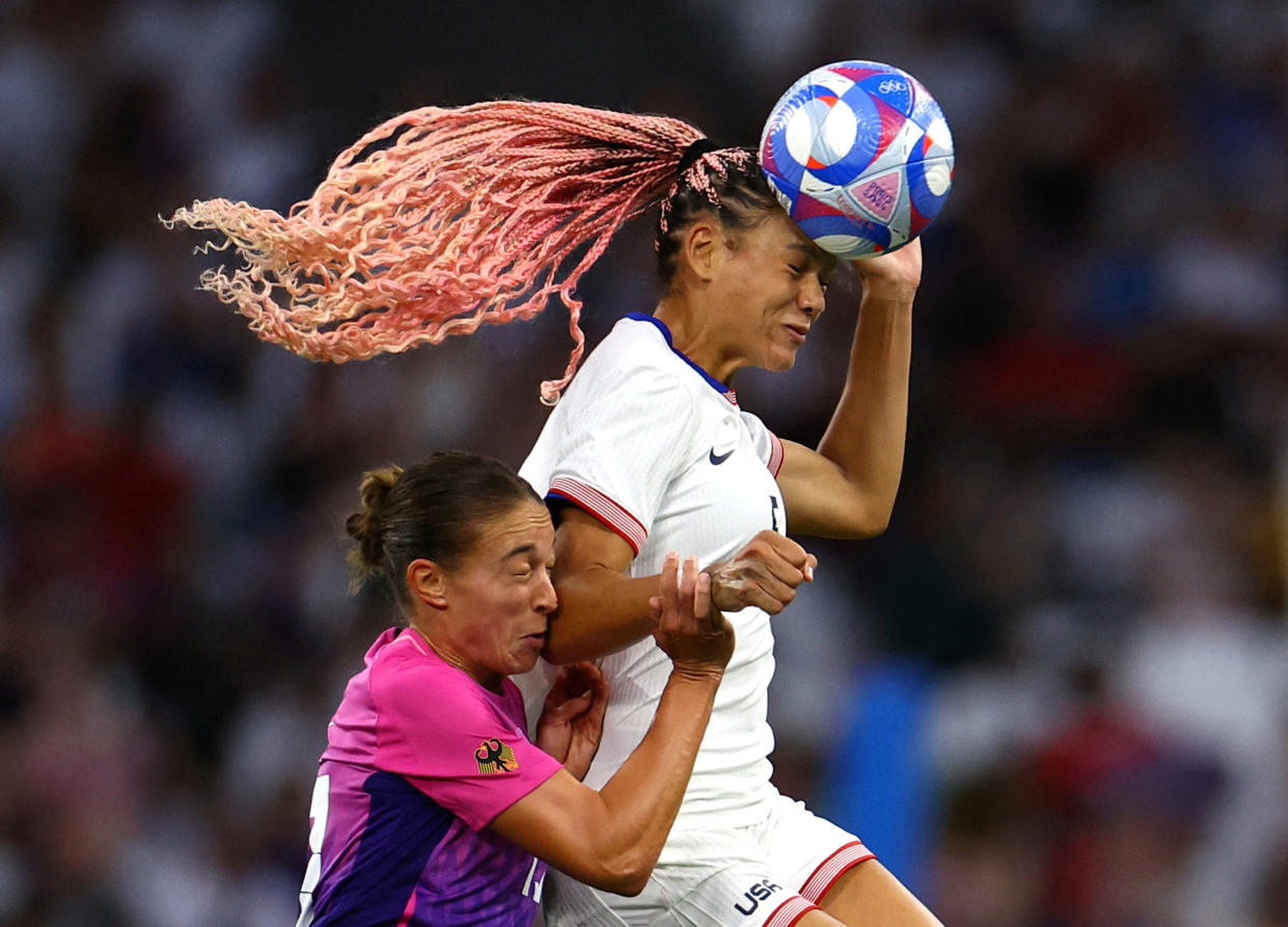 Trinity Rodman of United States in action with Felicitas Rauch of Germany a soccer match in Marseille. 