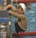 U.S. Olympic swimmer Janet Evans is seen taking a break during her morning training Saturday in Seoul September 10, 1988 as she and the other U.S. Olympic swimmers prepare to compete in the Seoul Olympic Games. (AP Photo/Lennox McLendon)