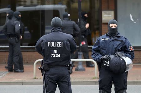 German special police forces outside a muslim prayer room in Hildesheim, Germany, March 14, 2017. REUTERS/Kai Pfaffenbach