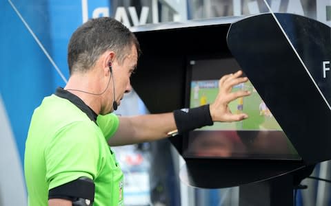 Referee Joel Aguilar reviews the VAR footage, before awarding Sweden a penalty during the 2018 FIFA World Cup Russia group F match between Sweden and Korea Republic at Nizhniy Novgorod Stadium on June 18, 2018 in Nizhniy Novgorod, Russia - Credit: Getty Images