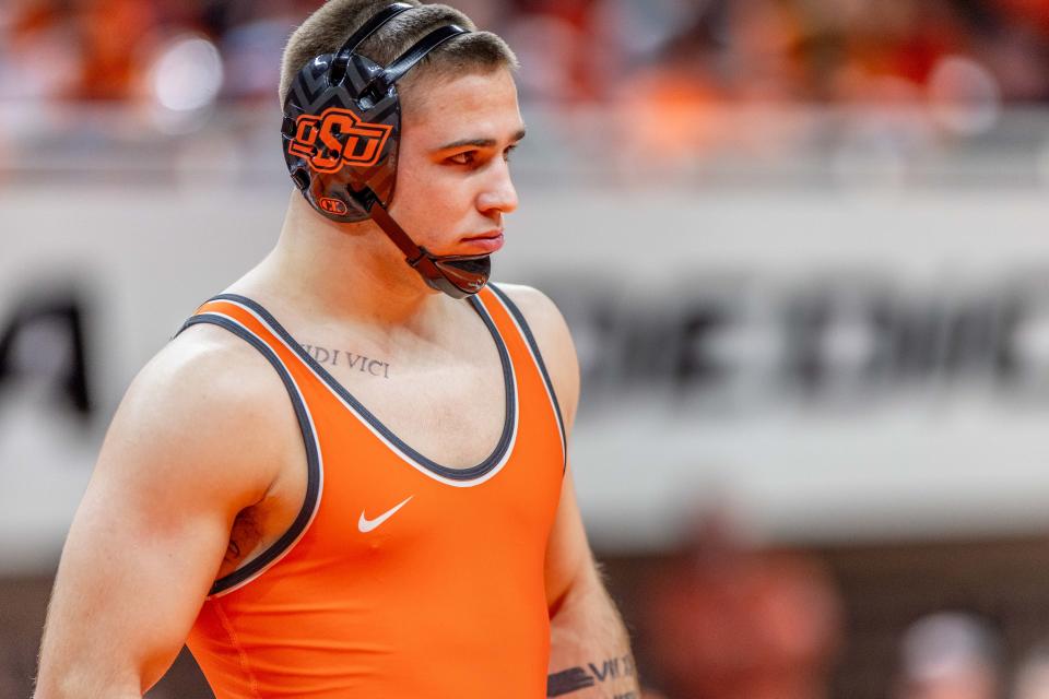 Oklahoma State freshman Jersey Robb sealed the Cowboys' 21-12 victory over Iowa State with a 15-6 major decision against Julien Broderson at 197 pounds on Saturday night at Gallagher-Iba Arena in Stillwater. Robb, who is from Bixby, was serving as the injury replacement for senior Luke Surber.