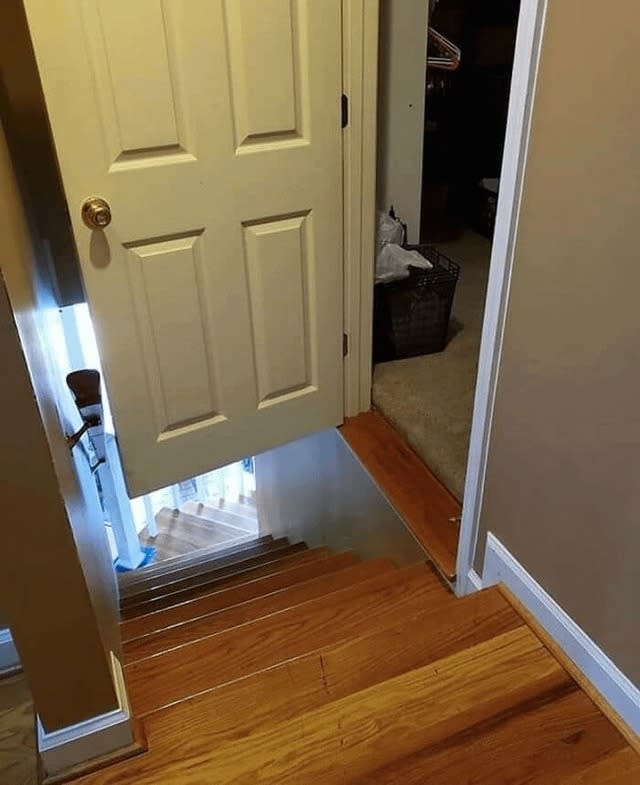door opens to the middle of a flight of stairs with no safe way to step out