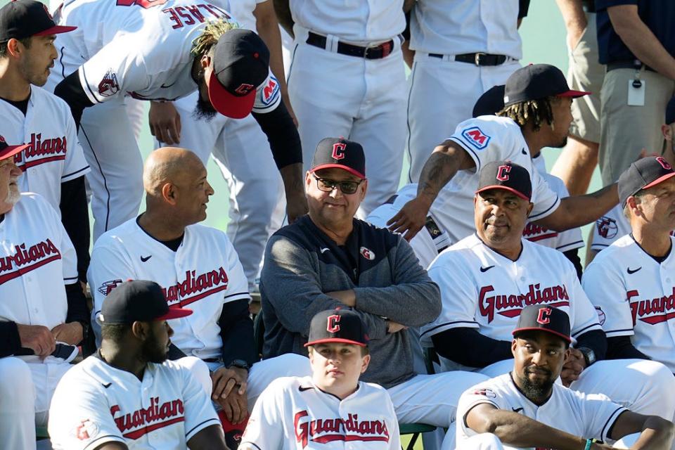 Cleveland Guardians manager Terry Francona, center, poses with the team for a photo before a baseball game Friday, Sept. 22, 2023, against the Baltimore Orioles, in Cleveland. (AP Photo/Sue Ogrocki)