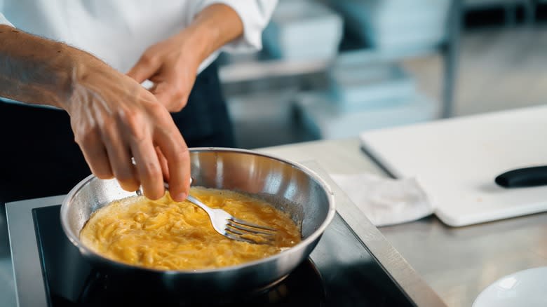 Eggs cooking in pan