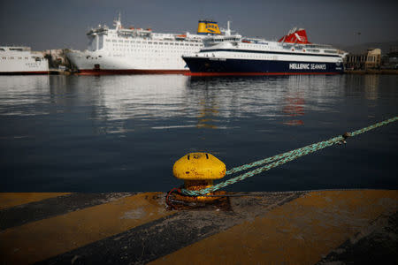 Passenger ferries are moored during a 24-hour strike of Greece's seamen's federation PNO, at the port of Piraeus, Greece, April 18, 2018. REUTERS/Alkis Konstantinidis