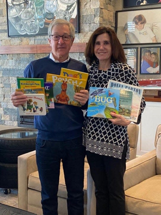 Carol and David Bazarsky show off some of the Imagination Library favorites.