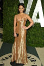 Olivia Munn arrives at the 2012 Vanity Fair Oscar Party in Los Angeles, CA.